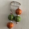 Green & orange ceramic + silver beads