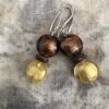 Two colour flattened round glass beads